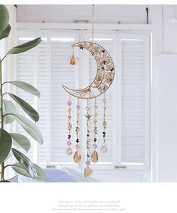 Detailed view of moon tree of life suncatcher with golden wire and crystal beads