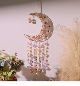 Detailed Tree of Life suncatcher casting elegant shadows against a soft pink wall