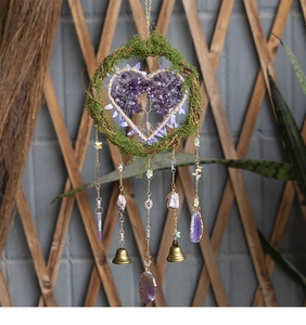 Detail of Tree of Life dreamcatcher with purple crystal heart and mossy rattan ring