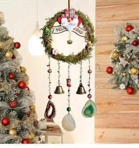Detailed pine wreath with Feliz Navidad banner, bells and colorful agate slice pendants
