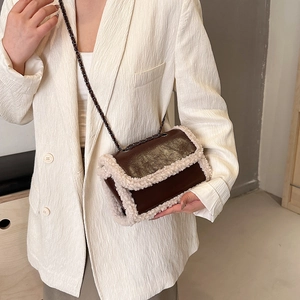 Vintage shoulder bag in brown leather and white faux shearling with chain strap for women
