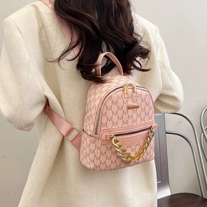Chic pink mini backpack for women with M-letter print and stylish gold chain detail