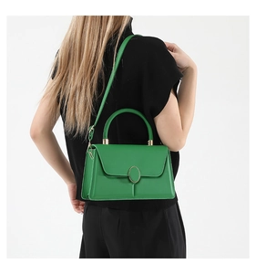 Green square handbag on model back view showing actual size and strap length