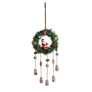 Christmas wreath with Santa Claus, gingerbread man and hanging crystal wishing bottles