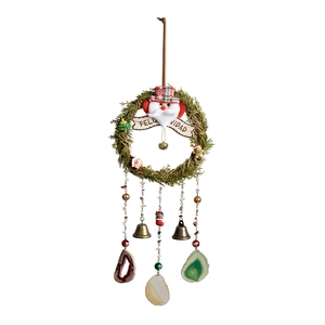 White nine-pointed paper star lantern with festive cutout patterns for Christmas window decor