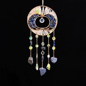 Tree of Life suncatcher with colorful crystals and blue stones on a gold metal frame
