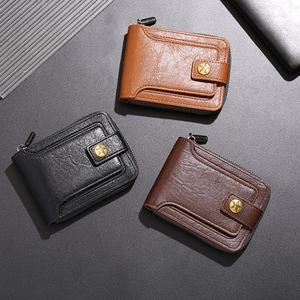 Detailed view of leather wallets in black and brown with vintage star buckle closure