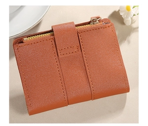 Nahaufnahme der braunen Damen-Bifold-Geldbörse mit Litschi-Muster und Reißverschlussfach