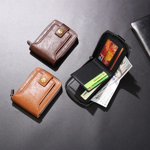 Macro shot of men's bifold zip wallet showing multiple card slots and internal layout