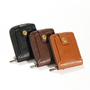 Three men's zip wallets in litchi leather with star buckles and metal zippers