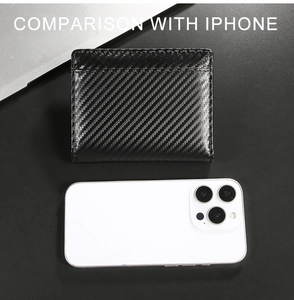 Compact carbon fiber RFID wallet size comparison with iPhone for portable daily use