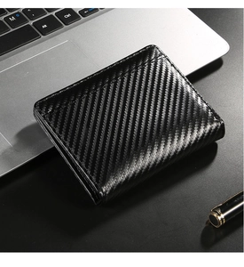 Detailed view of black carbon fiber texture RFID wallet on a modern business desk