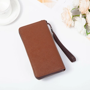 Brown long wallet with Saffiano texture and wrist strap shown on minimalist background
