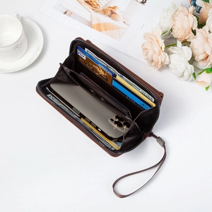 Detailed interior of men's long brown wallet showing card slots and large capacity