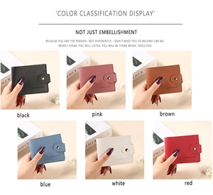 Litchi pattern leather wallets in six colors with metallic snap and embossed brand logo