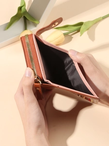 Portafoglio compatto in pelle marrone arancio con zip dorata e scomparti per carte