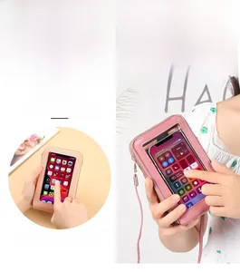 Pink multi-functional phone bag with a transparent touch-screen window for easy mobile use