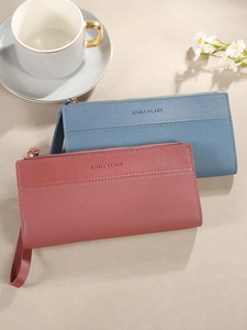 Minimalistische lange ritsportemonnees in leer met polsbandjes in blauw en rood design