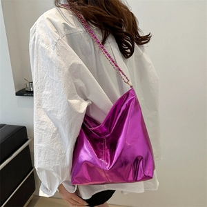 Metallic purple chain tote bag for women showing a stylish large capacity shoulder carry