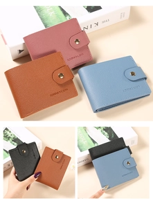 Litchi pattern leather wallets with gold metal buckle closures and embossed brand logo