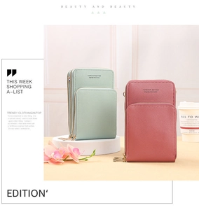Detail of mint green and dusty pink PU leather phone bags with three zipper pockets