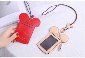 Detail of Mickey-shaped PU leather card holders with zip pocket and neck lanyards