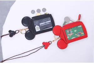 Detail of Mickey mouse cartoon card holder with clear slot, metal zipper and long lanyard