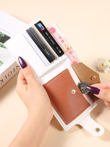 White litchi pattern leather wallet with multiple card slots and brown snap coin pocket