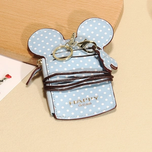 Detail of light blue polka dot Mickey card holder with zipper, key ring, and lanyard