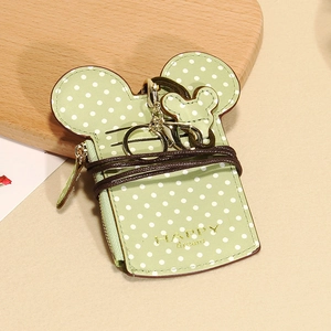 Detailed view of Mickey-shaped polka dot card holder with zipper and lanyard keychain