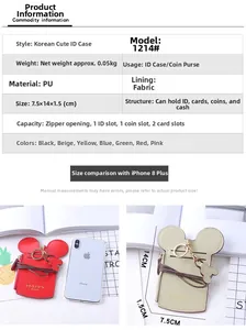 Detail view of cartoon mouse ears card holder showing internal slots and size comparison
