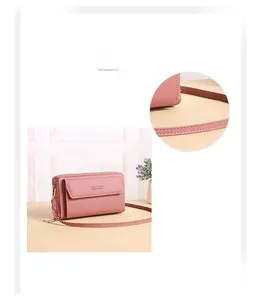 Pink PU leather crossbody phone bag featuring a soft shoulder pad and dual zippers