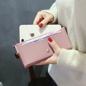 Pink faux leather long wallet for women with snap closure and multi-card slots