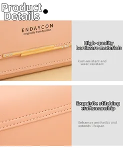Macro d'un portefeuille rose montrant les détails dorés et les coutures de précision