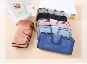 Stack of multi-colored matte leather long wallets with buckle and forever embossed text
