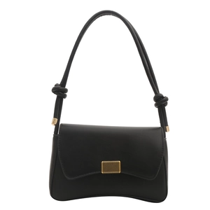 Minimalist black matte underarm bag with gold textured lock and knot shoulder strap
