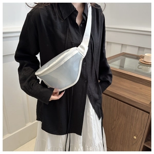 Detail of white translucent waterproof chest bag with adjustable strap on model