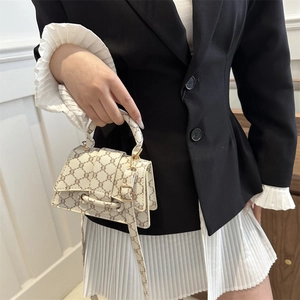 Borsa a tracolla retrò in tela con motivo monogramma e fibbia dorata da donna