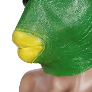 Close-up of green fish latex mask showing detailed skin texture and yellow lips