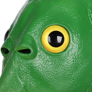 Macro shot of green latex fish mask showing detailed bumpy texture and yellow eye