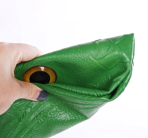 Macro detail showing the flexible latex texture and realistic green snake scales on mask