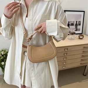 Fashion khaki half-moon hobo bag with adjustable straps and gold lettering detail