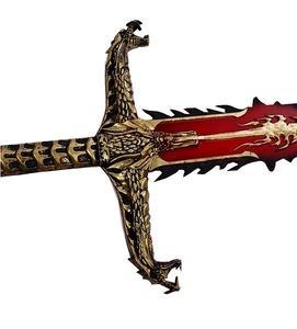 Detailed close-up of golden dragon hilt and red flame patterned blade on cosplay sword