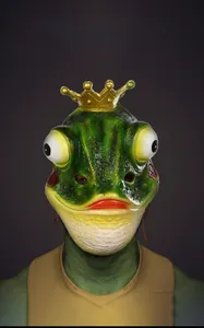 Detailed close-up of green latex frog prince mask with golden crown for cosplay
