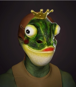Detailed view of green frog mask with crown and textured skin for cosplay party