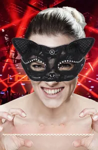 Close-up of black lace cat mask with sparkling rhinestones for masquerade parties