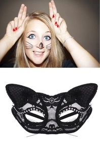 Detail of black lace cat mask with sparkling sequins and white rhinestones for party