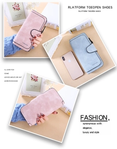 Detail of pink and blue matte leather trifold wallets with Forever embossed text