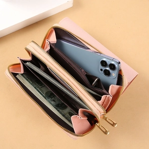 Grand portefeuille rose en cuir pour femme avec double fermeture éclair et porte-téléphone