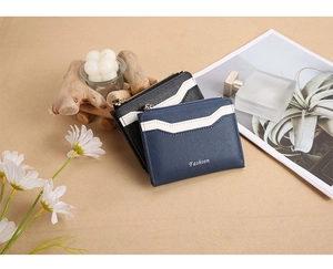 Compacte PU-lederen korte portemonnee met ritsvak en contrasterend kleurendesign voor dames.